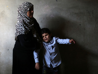 Palestinian boy Mohammed Shaban,8, lost his sight after an exploded missile blinded him during the recent 11-day war between Israel and the...