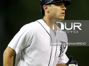 Detroit Tigers' Ian Kinsler rounds the bases after his two-run home run in the eighth inning of a baseball game against the Seattle Mariners...