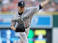 Seattle Mariners starting pitcher J.A. Happ delivers a pitch in the first inning of a baseball game against the Detroit Tigers in Detroit, M...