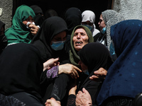 The mother of Palestinian Osama Deeij, who died of a wound he sustained during an anti-Israel protest at the Israel-Gaza border fence on Sat...