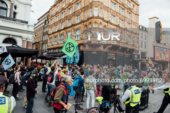 Extinction Rebellion protesters return to London, UK, on August 25, 2021 on day three of their 'Impossible Rebellion' series of actions. Beg...