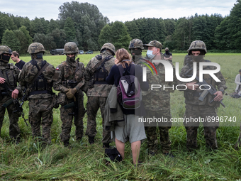 Military refuse journalist access to group of Afghan migrants trapped at border between Poland and Belarus. On August 26, 2021 at Border Pol...