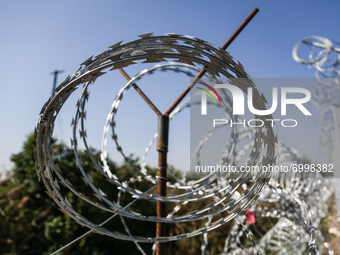 A barbwire fence erected by Hungary at the border line between Serbia and Hungary in Roszke, southern Hungary on September 14, 2015. A razor...
