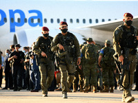 Members of Spanish forces disembark from a plane with evacuees from Afghanistan at Torrejon Military Air Base in Madrid, Spain  on 27th Augu...
