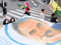 A giant flag bearing the effigy of Abdullah Ocalan in the Kurdish demonstration in Paris, France, on August 28, 2021As the French and Iraqi...