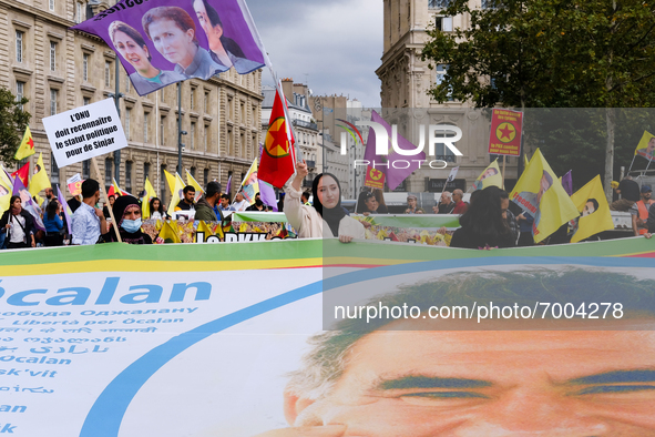 A giant flag bearing the effigy of Abdullah Ocalan in the Kurdish demonstration in Paris, France, on August 28, 2021. As the French and Iraq...
