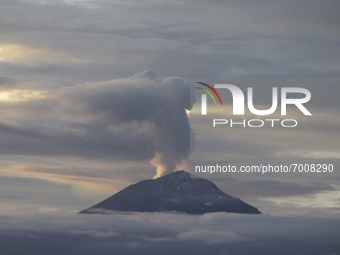 Popocatépetl volcano emits a plume of water vapour, gases and ash, during dawn and COVID-19 health emergency in Mexico. (