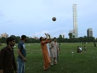 Afghan origin men residing in India play Volleyball during the National Sports Day at a public park in Kolkata on August 29,2021. (