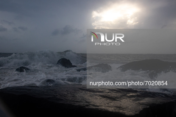 Waves crash on shore as remnants of Hurrican Ida hit Cape May Point, New Jersey, the southern-most tip of the state on September 1, 2021 