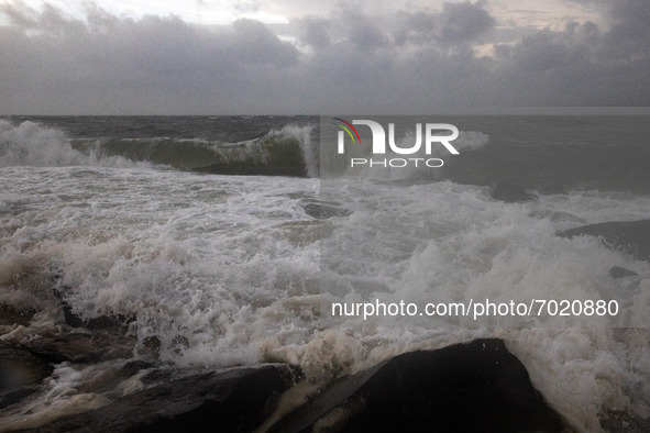 Waves crash on shore as remnants of Hurrican Ida hit Cape May Point, New Jersey, the southern-most tip of the state on September 1, 2021 