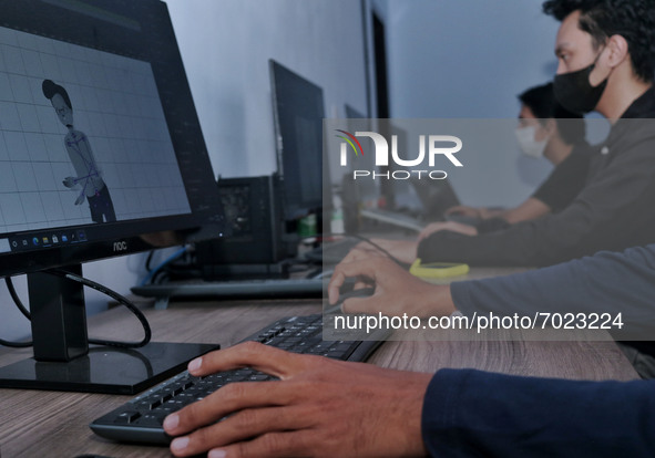 Some workers design an animation ad project at the Animation creative lab, Malang, East Java, on September 2, 2021. 
A start-up company that...