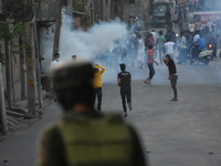 Kashmiri people clash with Indian forces after curfew was lifted in old city Srinagar, Indian Administered Kashmir on 02 September 2021. Cur...