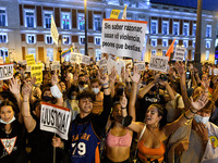 Hundreds of protesters in the streets of Madrid on Wednesday evening, chanting, holding placards reading `justicia´ with some wrapped in rai...