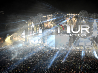 Lights show and people dancing during Martin Garrix's performance at the main stage of UNTOLD festival (