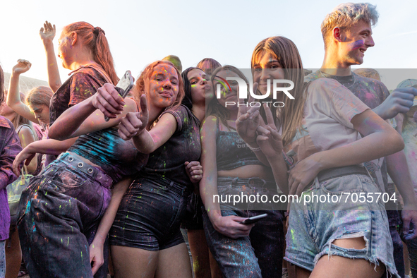 People enjoy  a  time out during the Colour Festival by the Tauron Arena in Krakow as the holiday season reaches an end and families take th...
