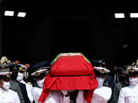 Portuguese military personnel carries the flag-drapped coffin of the late former Portuguese President Jorge Sampaio during the funeral cerem...