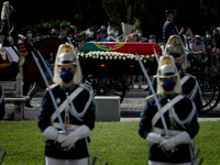 A horse-drawn carriage carrying the coffin of the late former Portuguese President Jorge Sampaio arrives for his funeral ceremony at Jeronim...
