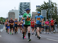 Runners cross the Tyne Bridge during the BUPA Great North Run in Newcastle upon Tyne, England on Sunday 12th September 2021.  (