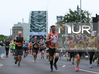 Runners cross the Tyne Bridge during the BUPA Great North Run in Newcastle upon Tyne, England on Sunday 12th September 2021.  (
