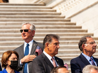 Senator Tommy Tuberville (top), Republican of Alabama and staunch Trump supporter, turns his back as a quartet from the US Army Band, “Persh...