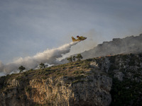 The Italian Fire Fighters in action with Canadair CL-415 for extinguish the arson attack near the Temple of Jupiter Anxur, Mount Sant'Angelo...