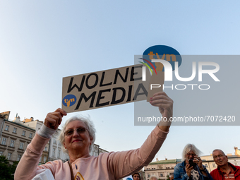 Polish people demonstrate on the Main Market Square in Krakow in support of free media after so-called Lex TVN legislation was discussed in...