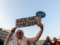 Polish people demonstrate on the Main Market Square in Krakow in support of free media after so-called Lex TVN legislation was discussed in...