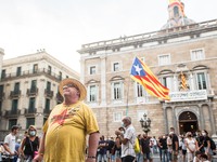 Protester in front of the Generality of Catalonia is seen with a shirt that says, Independence.
The political party The Popular Unity Candid...