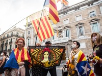 Protesters in front of the Generality of Catalonia are seen with Catalan independence flag.
The political party The Popular Unity Candidacy...