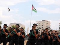 Palestinian members of Hamas' security forces attend a police graduation ceremony in Gaza City on September 16, 2021.
 (