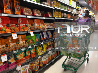 Woman shopping at a grocery store in Toronto, Ontario, Canada on September 16, 2021. Canada's inflation rate reached 4.1% in August, highest...