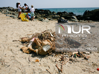 Volunteers pick up garbage during a collection day for World Beaches Day amidst the Coronavirus pandemic in La Guaira, Venezuela on Septembe...