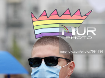 A participant attends the annual KyivPride gay parade as riot police provide security in Kyiv, Ukraine on 19 September 2021. LGBT  (Lesbian,...