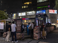 09/09/2021 Tokyo, Japan. 
Smoking area in Ginza, 
Outdoor smoking is frowned upon on public streets, and local governments have generally cr...