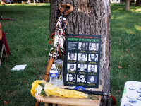 A memorial for Political Prisoners who died while still being held in prison rests against a tree in Tubman Park, during a rally in the Germ...