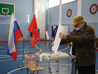 A man at a polling station during voting in the State Duma of the Russian Federation in St. Petersburg. Saint Petersburg, Russia, September...