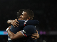 Mauro Icardi of PSG celebrates with Kylian Mbappe after scoring his sides first goal during the Ligue 1 Uber Eats match between Paris Saint...