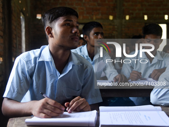 Students of class Xth attend a class in a school after Assam state government resumes classes for class 10th students, on 20 September 2021...