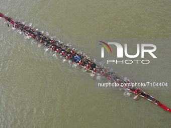  September 18, 2021: Participants  compete during the race  of the Traditional Bangladeshi Boat Race Contest in the Chenger Khal river in Ba...