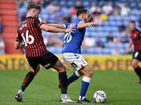  Oldham Athletic's Faysal Bettache tussles with Neill Byrne of Hartlepool United during the Sky Bet League 2 match between Oldham Athletic a...
