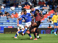  Oldham Athletic's Alan Sheehan and Oldham Athletic's Raphaël Diarra tussles with during the Sky Bet League 2 match between Oldham Athletic...