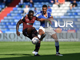  Oldham Athletic's Kyle Jameson tussles with Olufela Olomola of Hartlepool United during the Sky Bet League 2 match between Oldham Athletic...