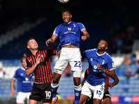  Oldham Athletic's Raphaël Diarra and Oldham Athletic's Kyle Jameson tussles with Luke Molyneux of Hartlepool United during the Sky Bet Leag...