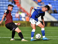  Oldham Athletic's Callum Whelan tussles with Luke Molyneux of Hartlepool United during the Sky Bet League 2 match between Oldham Athletic a...