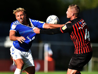 Oldham Athletic's Hallam Hope tussles with Gary Liddle of Hartlepool United during the Sky Bet League 2 match between Oldham Athletic and H...