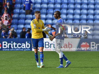  Oldham Athletic's Jayson Leutwiler (Goalkeeper) and Oldham Athletic's Dylan Bahamboula during the Sky Bet League 2 match between Oldham Ath...