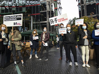 People attend a demonstration organized from Reporters without Borders against censorship of journalistic content on Facebook and other soci...
