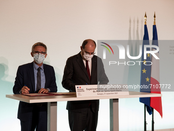 French Prime Minister Jean Castex and the President of the General Council of the Department of Seine Saint-Denis Stéphane Troussel signing...