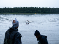 Athletes reaches the swim out, at Swedeman 2021 in Åre, Sweden (