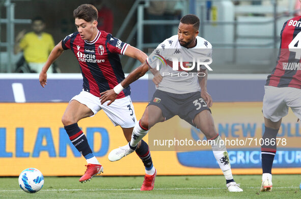 Aaron Hickey (Bologna F.C.) (left) competes for the ball with Hernani (Genoa CFC) during the Italian Serie A soccer match Bologna F.C. vs Ge...